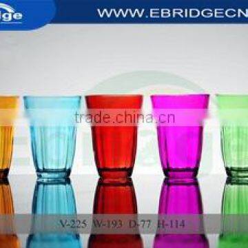 A variety of colored glass water cups