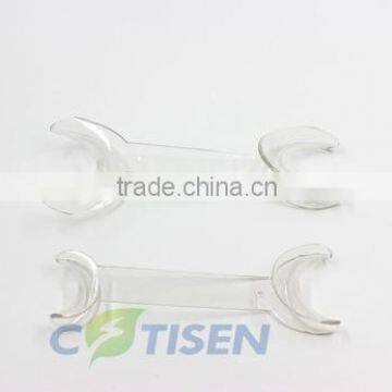 Disposable dental product cheek retractor