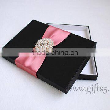 Elegant black packaging boxes for wedding invitations