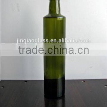 dark green glass olive oil bottle