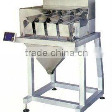 Four head electronic weigher