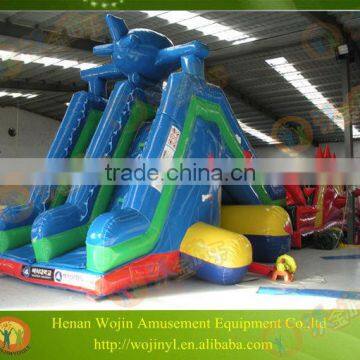 Inflatable bouncy castle with water slide