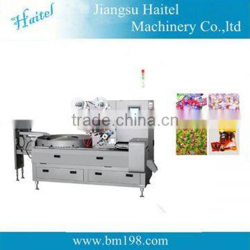 hot sales High speed full automatic pillow packing machine,cake making machine price