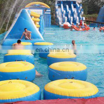 Giant outdoor aqua park with inflatable floating bridge equipment