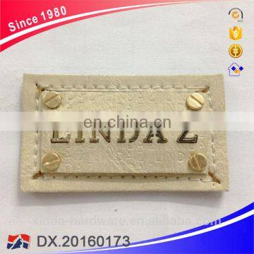 Ladies PU Leather Label with Metal Badge