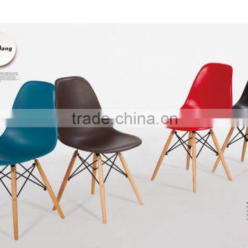 colorful plastic chair with wooden leg