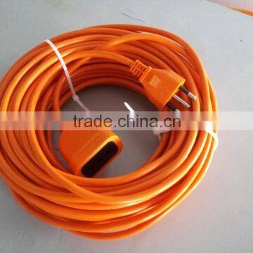 Chile extension cord in orange color with protector door