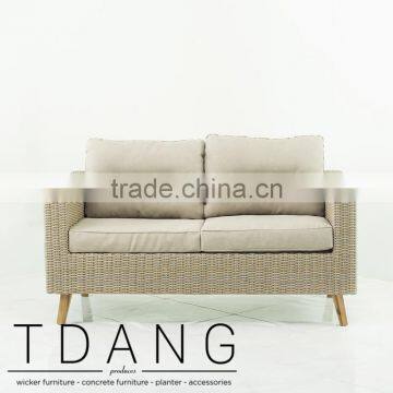 Fiji Wicker Sofa With Wooden Legs - Contemporary Rattan Furniture Garden Bench. photo-3