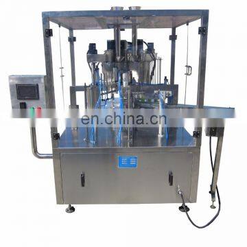 latest model rotary table yogurt filling and sealing machine