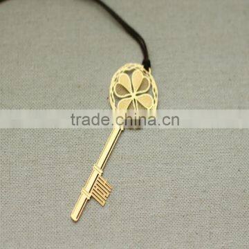 gold key plated etched custom metal bookmark