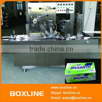 Automatic cellophane overwrapping machine