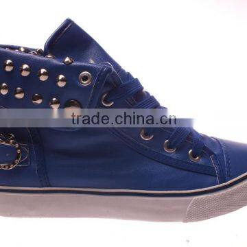 Fashion high cut sneakers with rivets and buckle strap decoration