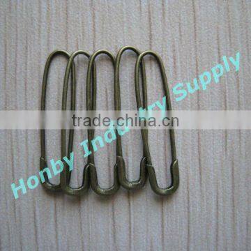 Traditional bronze U shaped safety pin for garment tags