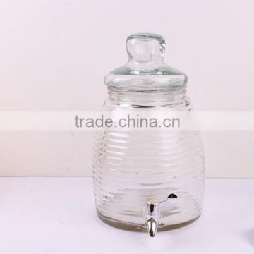 large glass beverage dispenser with faucet