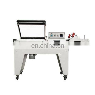 watsap+8615140601620 2 in 1 shrink manual candy wrapping machine