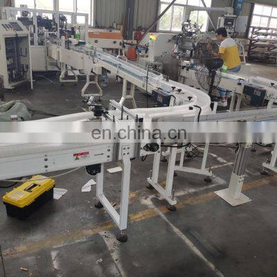 Полностью автоматизированная линия производства для упаковки пачек влажных салфеток в картонные коробки photo-3