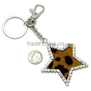 keyring with star pendant accented faux leopard fur and clear crystals keychain