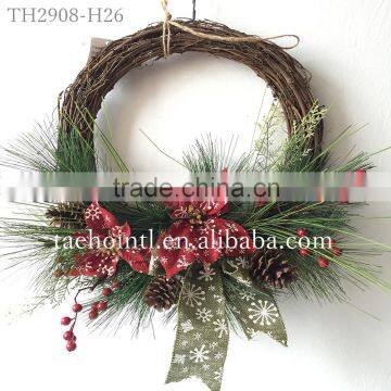 decorative christmas wreath with pinecone and ball