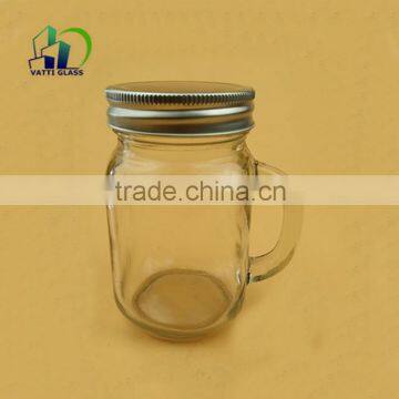 glass fruit juice bottle with golden lid