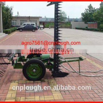 tractor cutting and raking machine