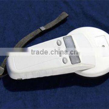 vet and animal using handle model electronic ear tag reader