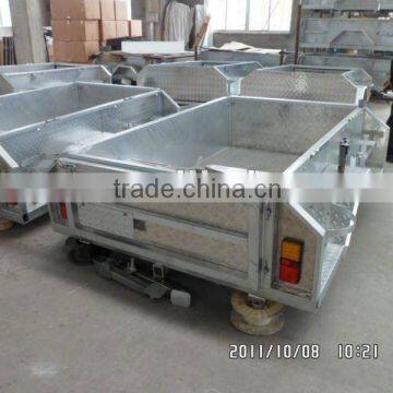 stainless steel tailgate kitchen on hot dipped galvanized camper trailer / travel trailer