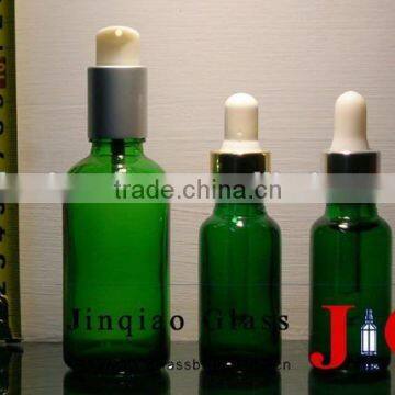 Green glass essential oil dropper bottle