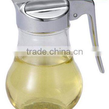 Glass honey dispenser with plastic plated lid