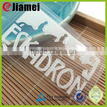 Factory custom transparent clear embossing raised rubber pvc patch labels