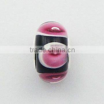 Intriguing Pinks On White In Black Murano Glass Bead