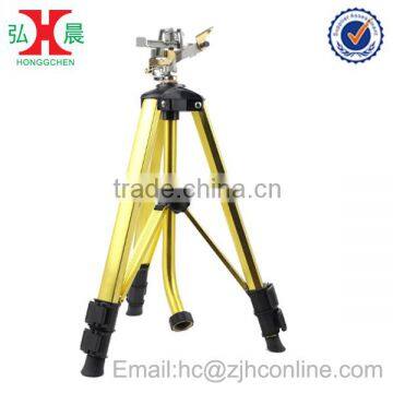 Brass Impact Impulse Sprinkler on Garden Telescopic Yellow Aluminum Tripod Sprinkler