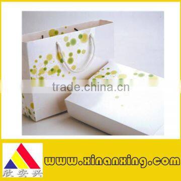 art paper bag with green decorated