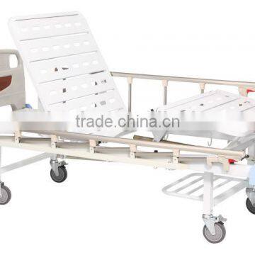 Double-rocker manual hospital bed