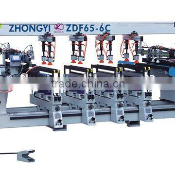 Automatic multi-drill machine for wood furniture