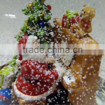 Christmas santa clause playing piano water globe