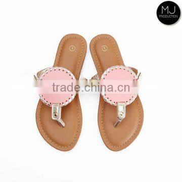 Stocked monogram solid disc kid sandal