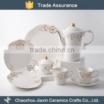 Royal flowe embossed white ceramic round dinner set with gold decal                        
                                                                                Supplier's Choice