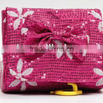 red sequins cosmetic bag with knot