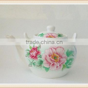 ceramic teapot with flower logo