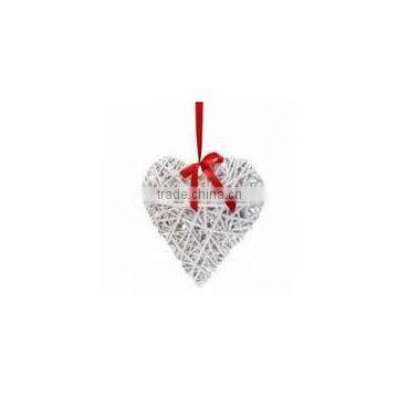 hanging white wicker heart for Christmas and wedding decorarion