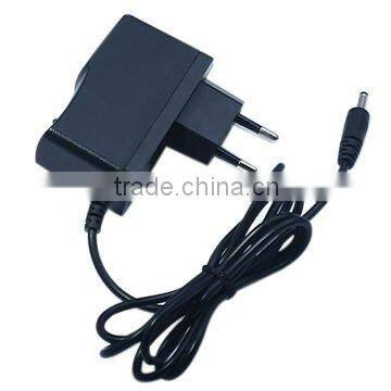 AC/DC Switching Adapter with wall mount 12V 1A