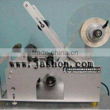 Semi-automatic labeling machine label sticking bottle machine