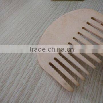 Natural wide tooth wood massage