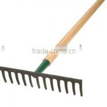 Forged garden level rake with long wood handle in home and garden