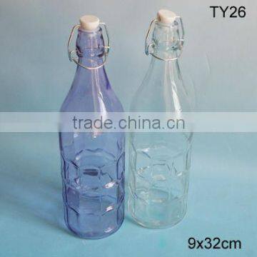 2016 cylinder beautiful glass bottle with embossing with clip lid