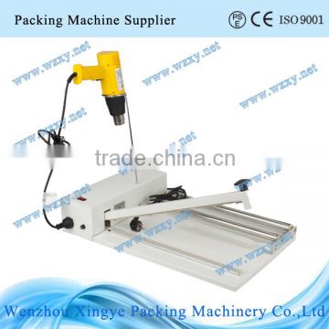 Semi-auto plastic bag sealing machine with shrinking function