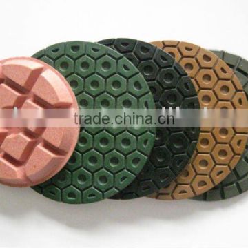 Abrasive polishing pads