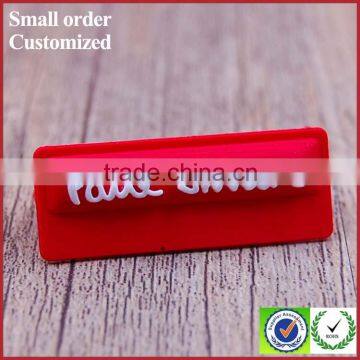 Custom red printing embossed pvc silicone label for shoe clothing