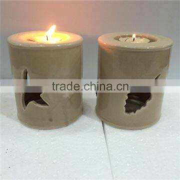 Star & leaf carved ceramic votive candle holder