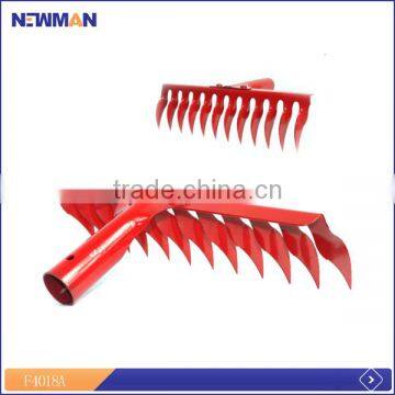 red color riveted grass lawn rake